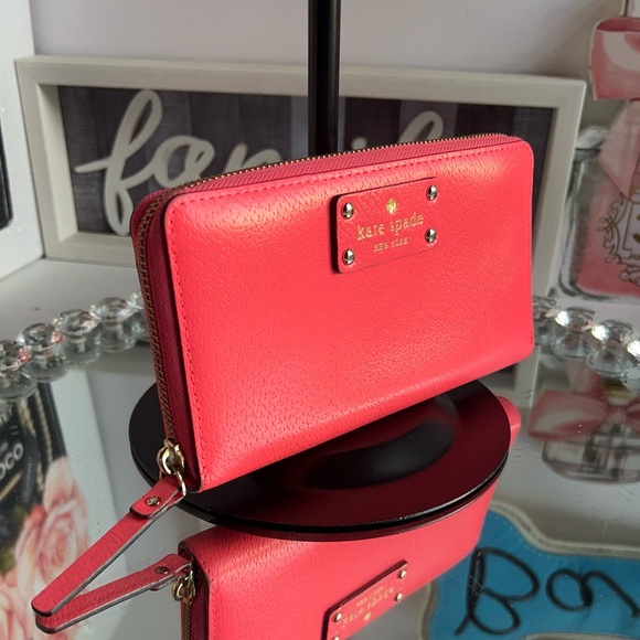 kate spade Handbags - Kate Spade Coral Zip-Around large Wallet like new